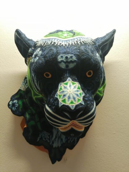 Cabeza de Jaguar arbol del viento en hilo